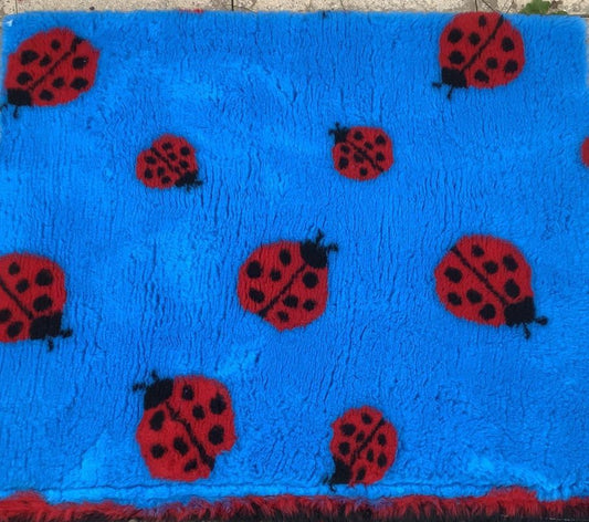 ladybird on blue Vet Bedding 1mt x 1.5 Mtr