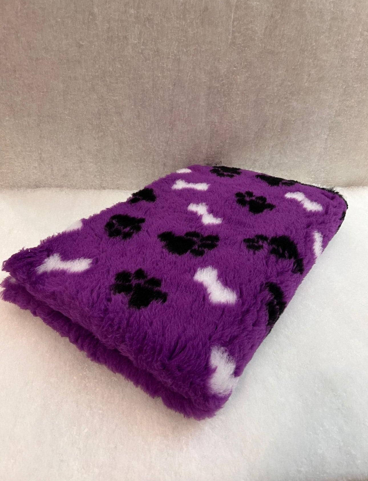 white bones red paws on purple Vet Bedding 1mt x 1.5 Mtr